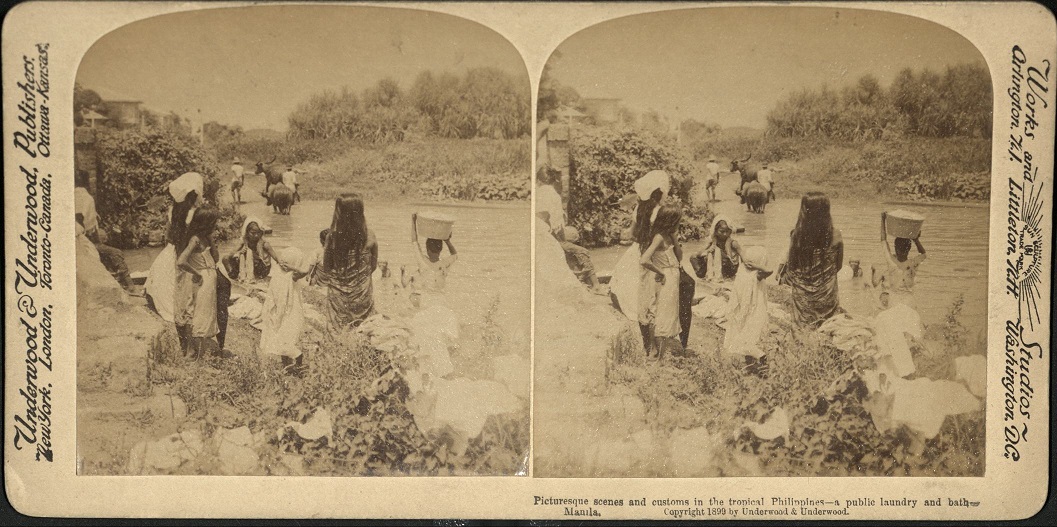 Picturesque scenes and customs in the tropical Philippines – a public laundry and bath, Manila.